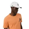 Pack Lacoste Novak Djokovic orangefarbenes T-Shirt und weiße Mütze